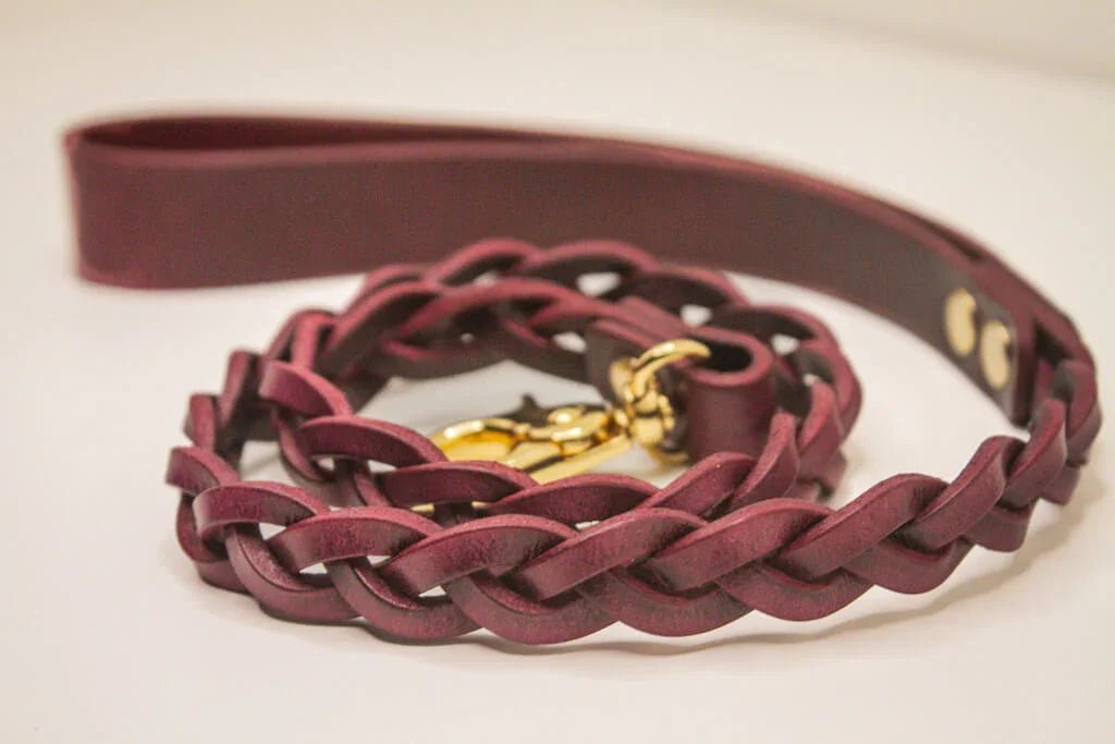 Braided Bordeaux Italian leather BDSM leash, handcrafted with a gold-tone clasp.