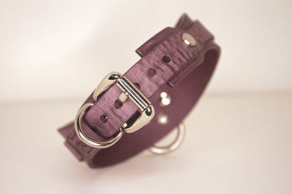 Back view of Haze purple leather BDSM cuff with silver-tone buckle and hardware.
