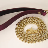 Handcrafted kinky Bordeaux Italian leather BDSM leash with gold-tone clip.