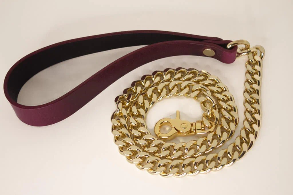 Handcrafted kinky Bordeaux Italian leather BDSM leash with gold-tone clip.