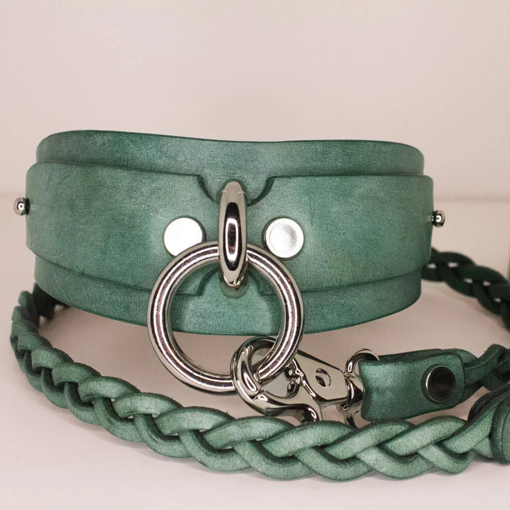 Complete set of Yucca green leather BDSM collar and leash with braided detail and silver hardware.