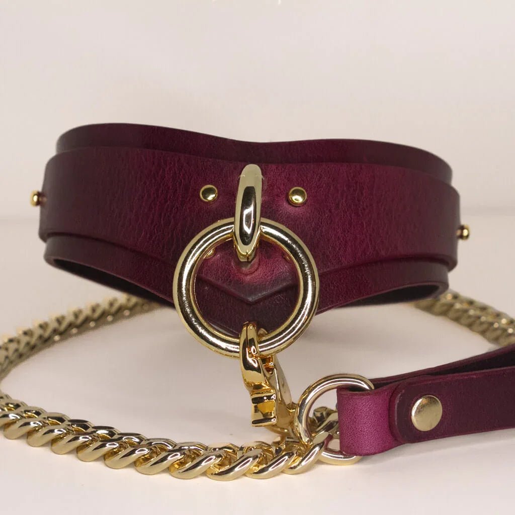Luxury Bordeaux Italian leather BDSM collar with gold-tone O-ring and heavy chain.