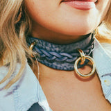 front view woman outside wearing cowboy core blue leather luxury bdsm collar 