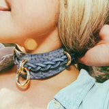 woman at stagecoach wearing blue leather cowboy core festival fashion