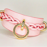 Pink custom leather day collar with braided detail and gold metal rings, high-quality leather cuffs