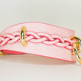 Pink leather day collar with braided design and gold rings, custom leather collar accessory
