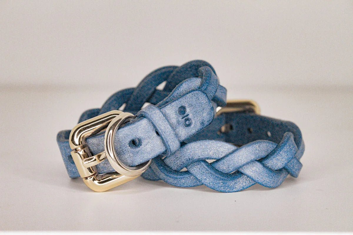 rear view luxury blue leather bdsm cowboy core handcuffs with gold hardware
