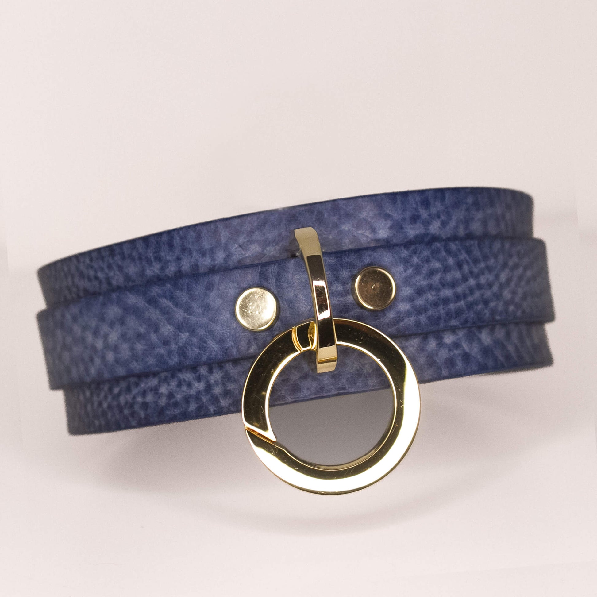 Handcrafted Horizon Collection BDSM leather collar in denim blue with textured finish and elegant gold-tone O-ring detail, available in various sizes for a custom fit.