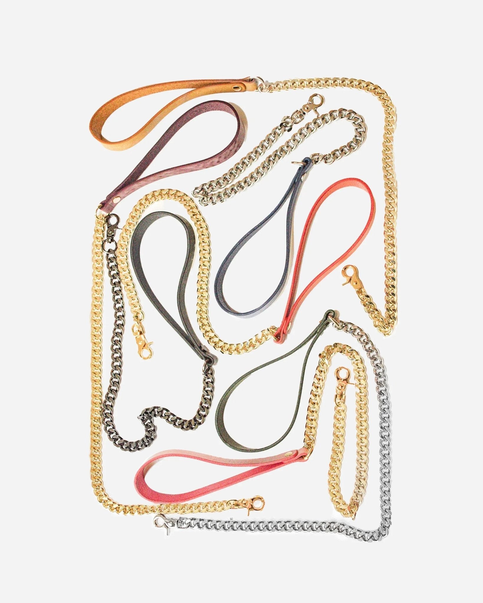 Leather day collar and leather wrist cuffs with gold and silver chain leashes in various colors