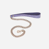 Purple leather day collar leash with silver chain and metal clasp on white background