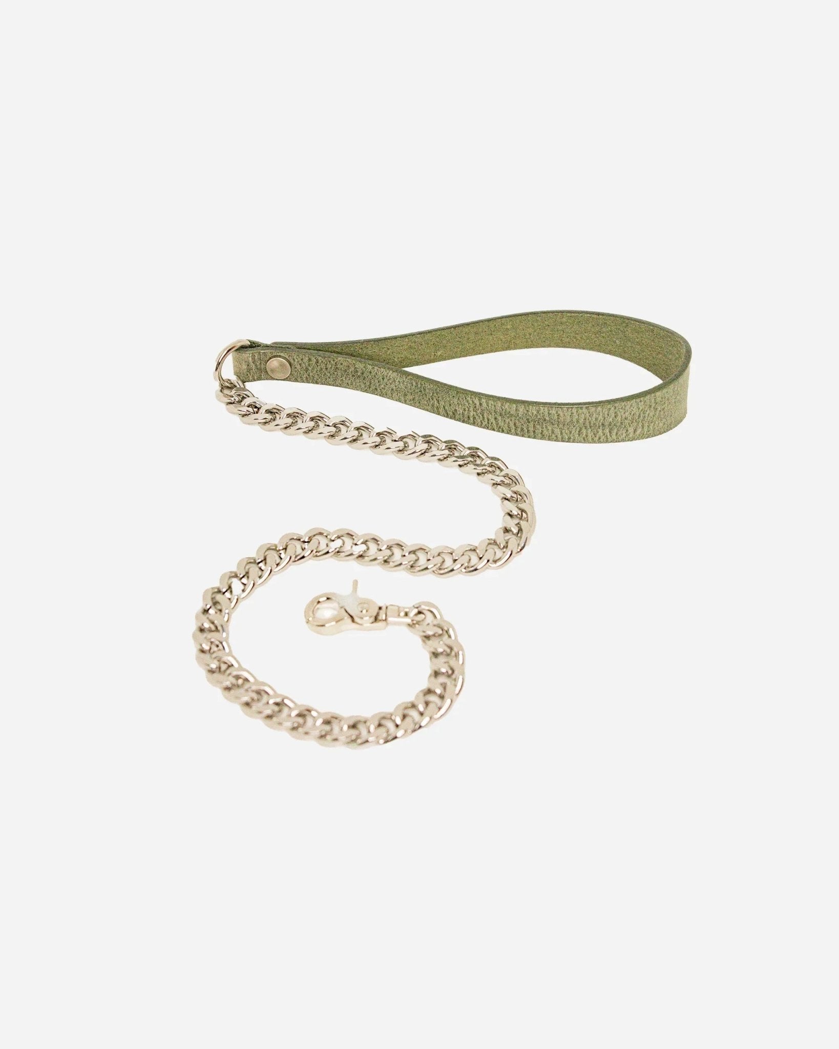 Green leather wrist cuff with attached silver chain leash on white background