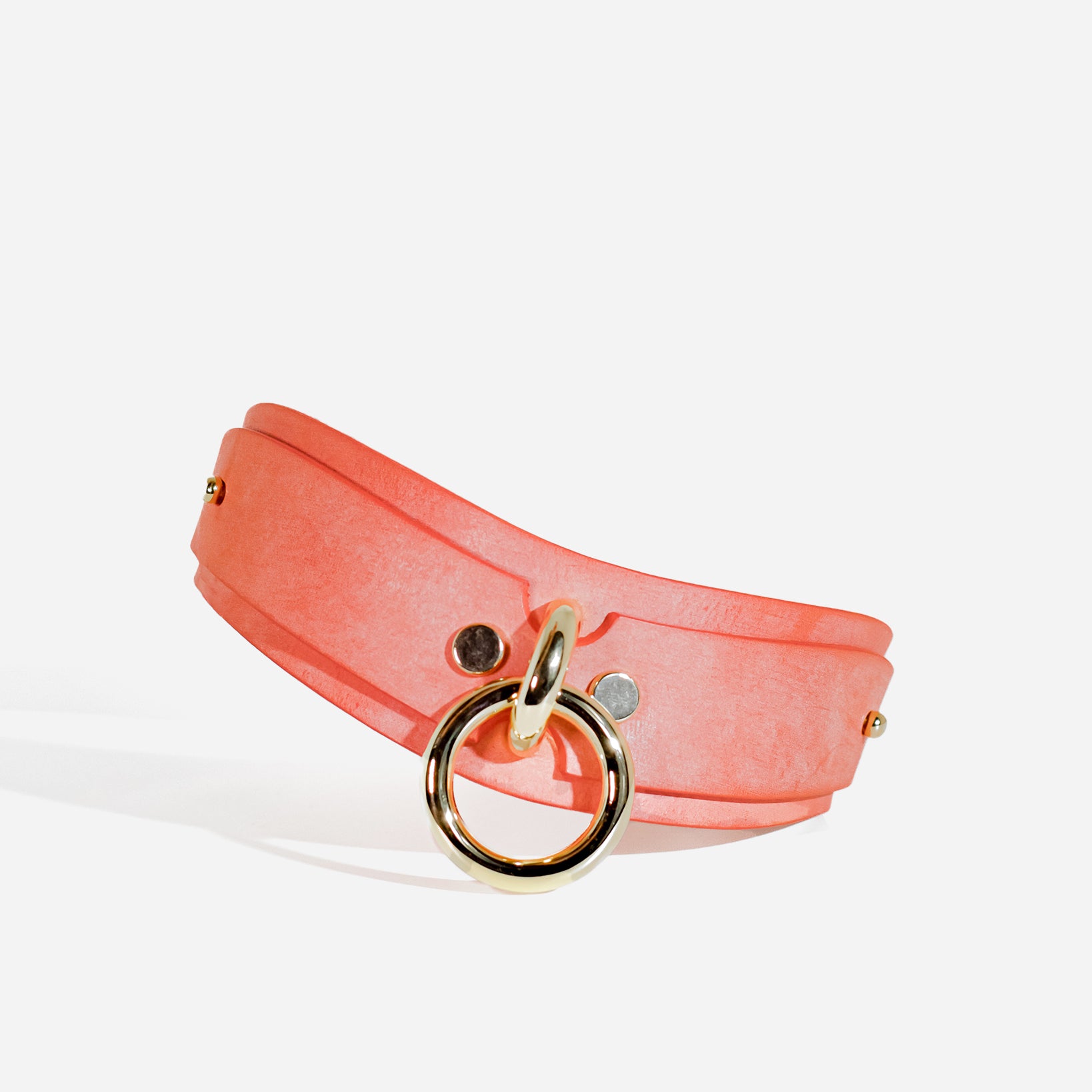 Coral custom bdsm collar with a gold ring buckle on a white background