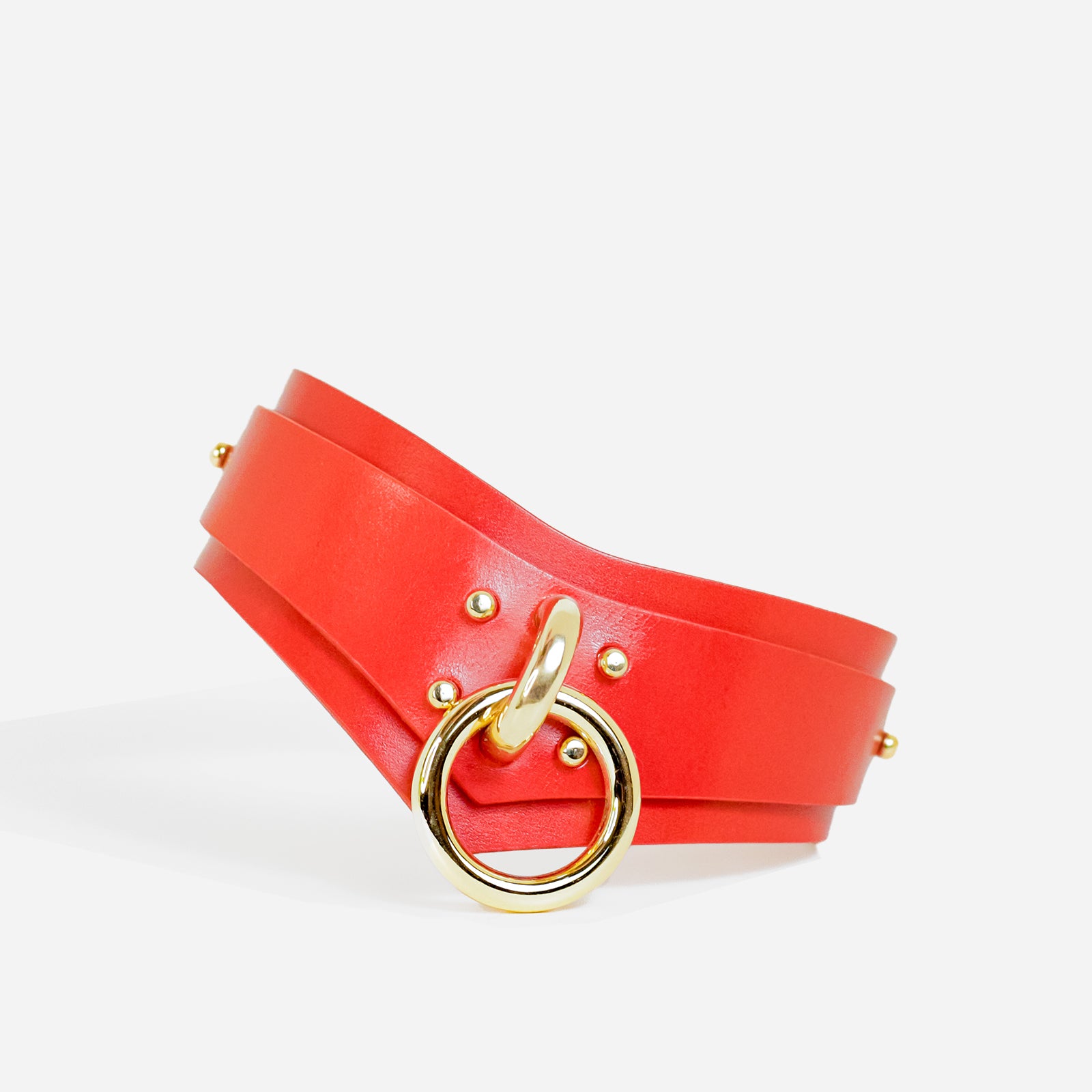 custom red leather bdsm collar with chunky gold hardware