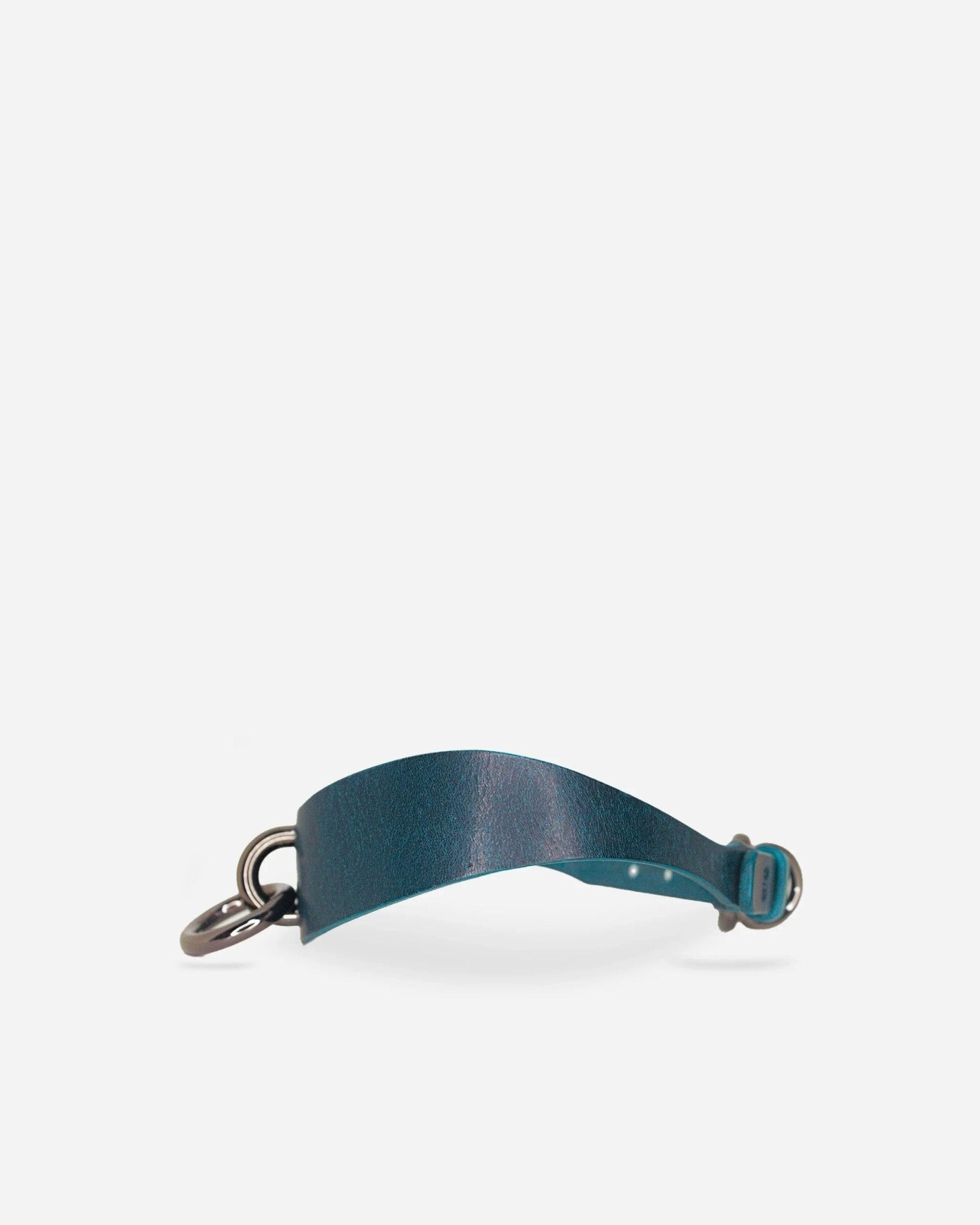 Blue leather day collar with metal rings and buckle on white background, featuring finely crafted leather collars