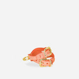 Coral leather cuffs with gold buckles and hardware on white background, handmade leather wrist cuffs