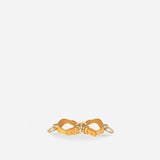 Pair of golden hour leather wrist cuffs with gold hardware on white background