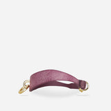 Purple full-grain Italian leather day collar with gold hardware, minimalist design on white background